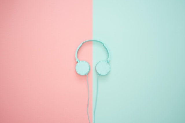 Headphones on two-tone background